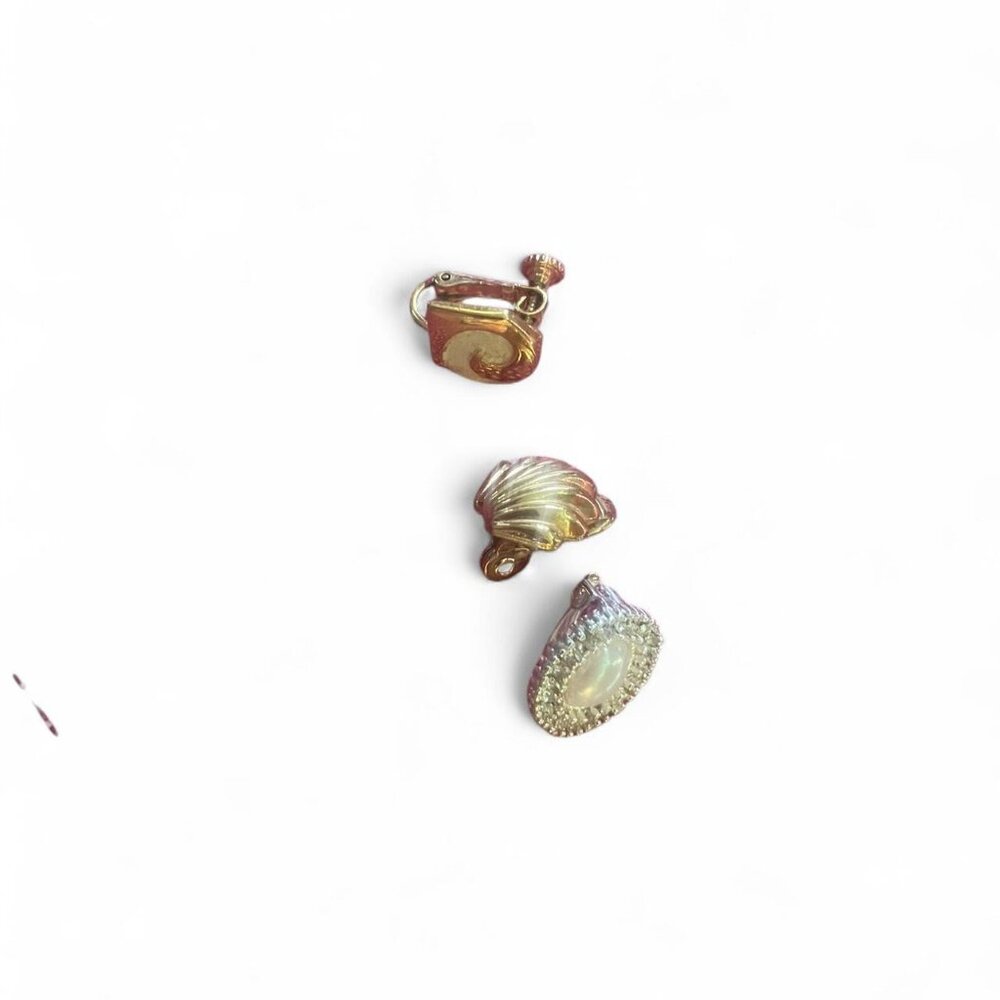 3 random assorted clip on earring